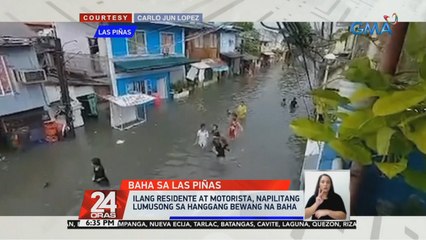 Ilang residente at motorista, napilitang lumusong sa hanggang bewang na baha | 24 Oras