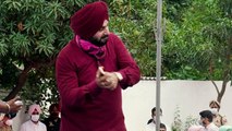Sidhu takes charge as Punjab Congress chief with a sixer, CM Amarinder Singh looks on