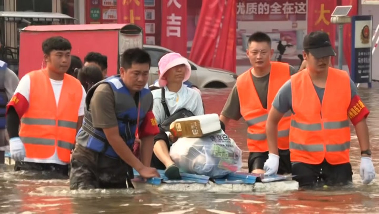 Crews rescue residents from flooding in China