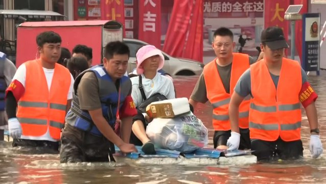 Crews rescue residents from flooding in China