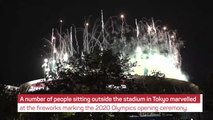 Fans applaud Tokyo Olympics opening ceremony fireworks from outside stadium