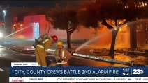 City, county crews battle two alarm fire