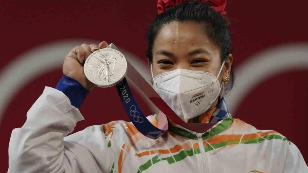 Who spotted weightlifting skills in Mirabai at young age?