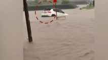 Rajkot: Car swept away in flooded water|VIDEO