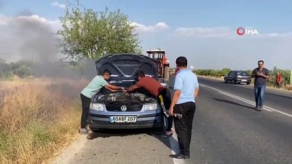 Şişelerle su taşıdılar otomobili yanmaktan kurtardılar