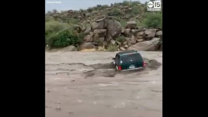 Download Video: VIDEO: Group rescued from floodwaters, overturned SUV at Sycamore Creek