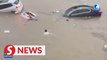 Footage shows heroes saving lives on highway of China's flood-hit Henan