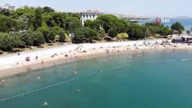 Sıcaktan bunalan vatandaşların denize girdiği Caddebostan plajı havadan görüntülendi