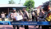 Polsek Grobogan Bagi Sayur Segar ke Warga Terdampak PPKM