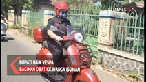 Bupati Naik Vespa Bagikan Obat ke Warga Isoman