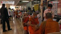 Buddhist monks receive AstraZeneca vaccine in Thailand