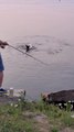 Guy Casts Fishing Line and his Pet Dog Jumps in Water Trying to Catch the Bait