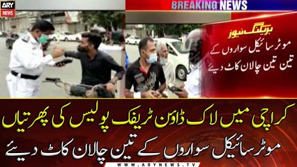 Police fines bike riders abundantly on the first day of newly imposed lockdown in Karachi