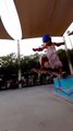 Little Girl Does Skateboarding and Tricks at the Skate Park