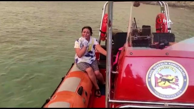 Yangında kayalıklara sığınan yaşlı adamı, Sahil Güvenlik kurtardı
