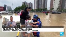 Death toll in central China floods rises to 302, dozens still missing