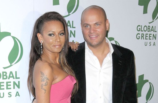 Mel B has accused her ex video-called their daughter while women in thongs danced around him
