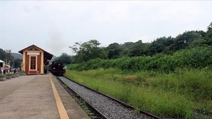 Steam Engine Departure from a beautiful Mountain Station