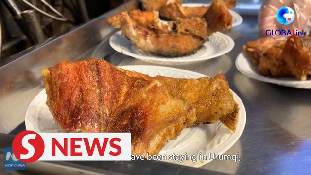 Xinjiang, My home: Grilled fish restaurant owner creates better life