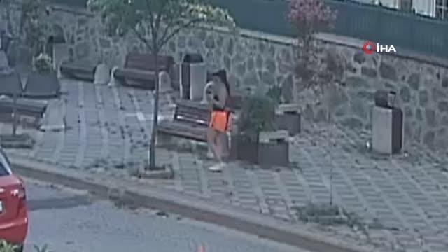 Bankta unutulan telefon ve cüzdanı kendisine aitmiş gibi aldığı anlar kamerada