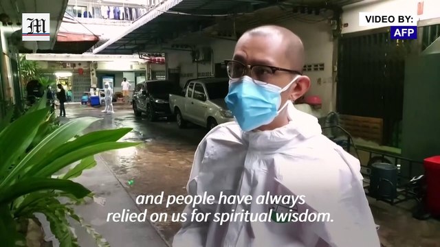 Thai monks put on protective gear as Covid cases surge