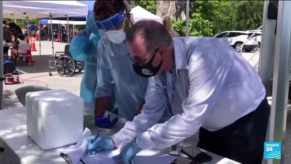 US belatedly hits Biden's Covid-19 vaccination goal as hospitalisations soar