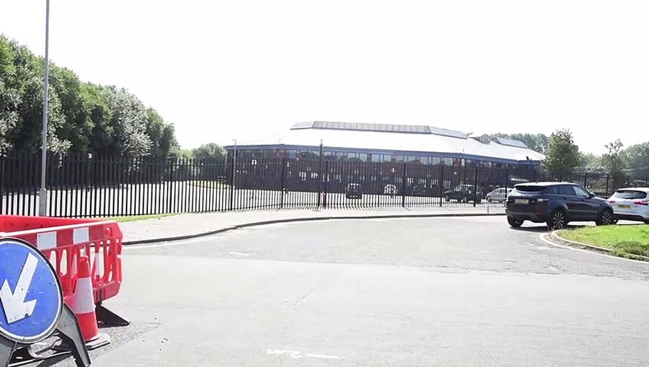 Police at the scene in Hawkley Hall, Wigan