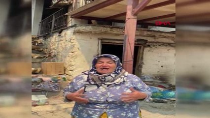 TÜRKİYE'NİN YÜREĞİNİ SIZLATAN FOTOĞRAFTAKİ KADIN EVİNİN YANDIĞINI BİLMİYOR