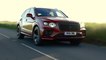 The new Bentley Bentayga Hybrid in Dragon Red Driving Video