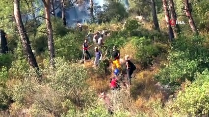 Marmaris’te tatil ve yangın bir arada