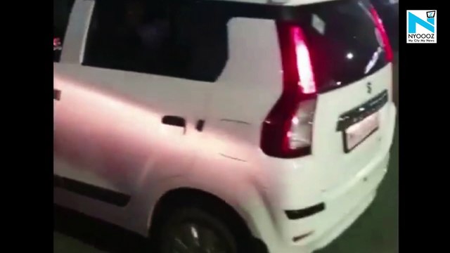 Watch, Drunk girl sleeps on road in Pune, blocks traffic