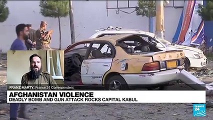 Powerful blasts and gunfire rock Afghanistan capital Kabul