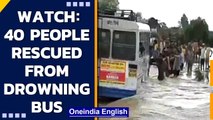 Rajasthan: SDRF rescues 40 passengers from bus stuck in overflowing stream in Kota | Oneindia News