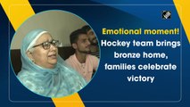 Emotional moment! Hockey team brings bronze home, families celebrate victory