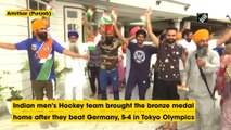 Emotional moment! Hockey team brings bronze home, families celebrate victory