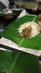 Kerala Meals Wrapped in banana Leaves