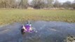 Woman Falls Into Frozen Puddle While Running as she Slips and Breaks the Ice