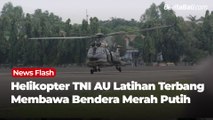 Helikopter TNI AU Latihan Terbang Membawa Bendera Merah Putih
