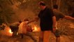 Residents desperately fight wildfires tearing through Greek island