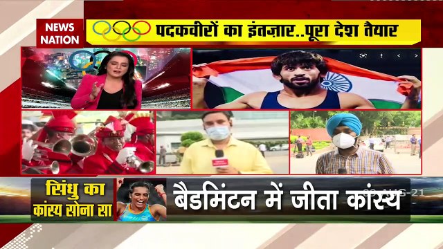 Country waiting for medalists of Tokyo Olympics, live report from Delhi airport