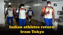 Indian athletes return from Tokyo to rousing welcome in Delhi
