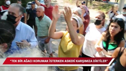 Download Video: Akbelen’de bir çevreci kendini ağaca zincirlemek istedi, arbede çıktı