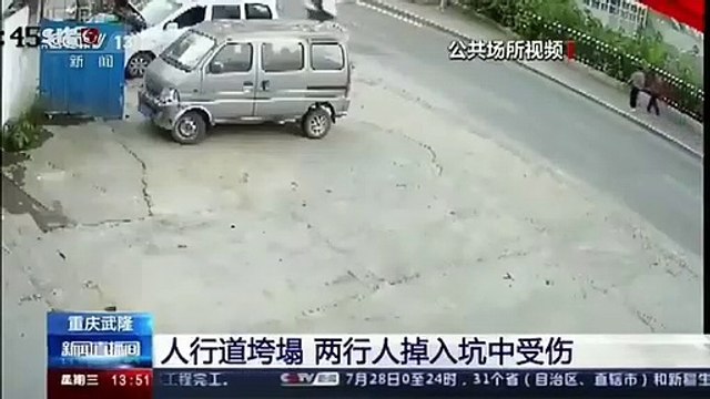 China: Duas pessoas engolidas em desabamento de passeio sobrevivem