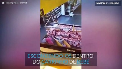 Mãe apanhada a roubar e a empilhar alimentos em cima de bebé