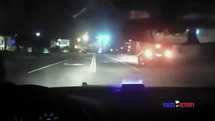 Imagens mostram polícia a salvar homem de carro a arder