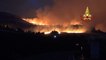 Firefighters battle massive flames as heat wave grips Italy