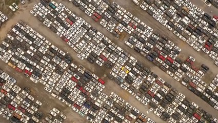 Thousands of flood-damaged cars await their fate in China