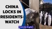 China locks residents amid Covid-19 surge | Metal bars across doors | Oneindia News
