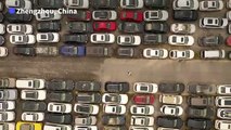 Hàng trăm ngàn chiếc ô tô bị bỏ lại sau trận mưa lớn ở Trung Quốc