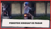 Aksi Pemotor Berhijab Hinggap ke Pagar, Motor Tersangkut Bikin Heran